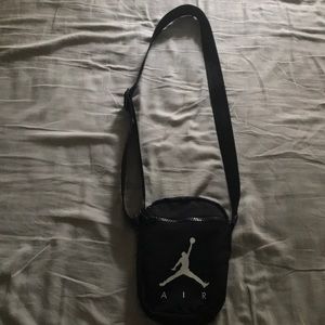 This is a Jordan side-bag/fanny pack